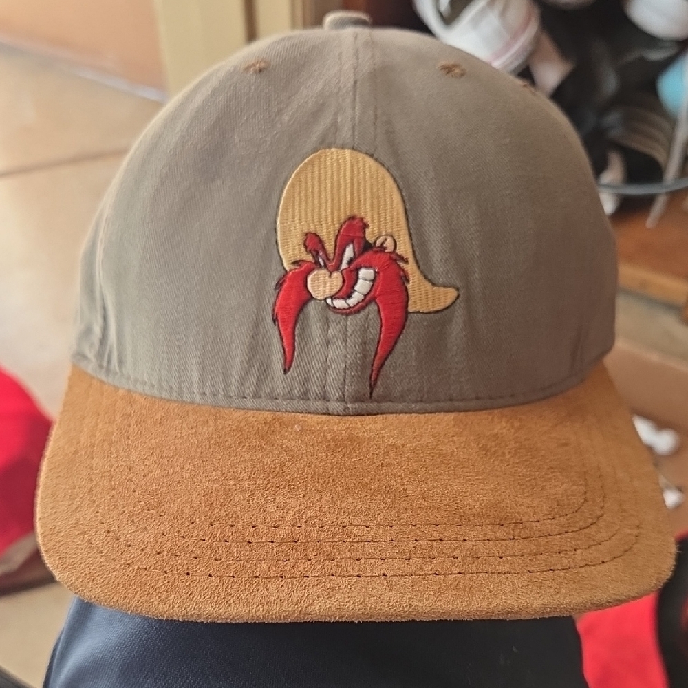 Brown and Tan Cap with Cartoon Logo